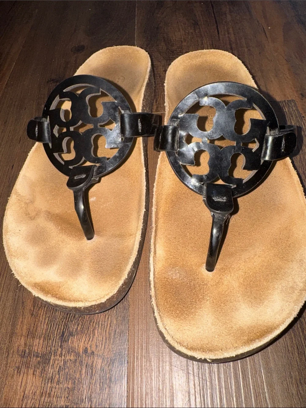 Tory Burch Miller Cloud sandals feature a black patent leather